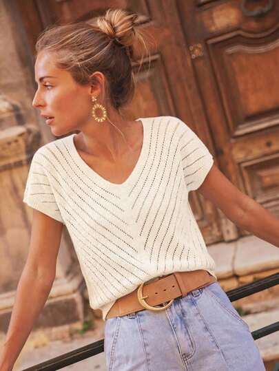 2026 Nuevo suéter de punto de cuello en V de manga corta, diseño calado elegante estilo francés, uso casual de longitud regular para primavera/verano, color blanco