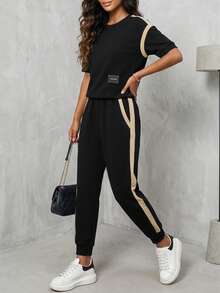 Conjunto de 2 piezas de mujer con camiseta de cuello redondo de manga corta con rayas de contraste y pantalón lápiz de cintura elástica recto, adecuado para primavera, verano y otoño, elegante en negro - Negro - Ver 1