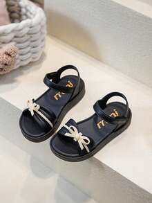 Dép xăng đan nơ mùa hè mới cho trẻ em, dép đế mềm, chống mài mòn, hở ngón dành cho bé gái đi biển. - màu đen - Xem 6