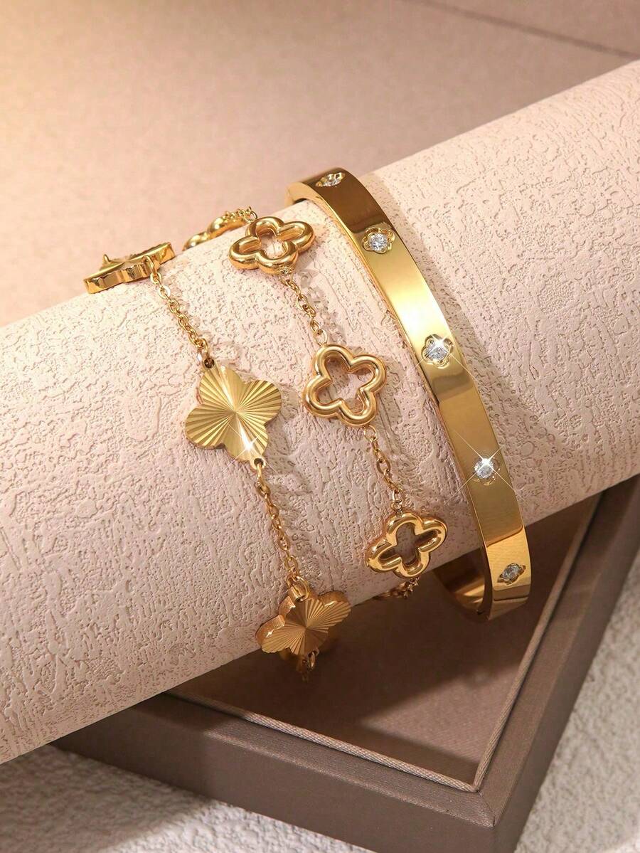 Bộ trang sức hình cỏ bốn lá bằng thép không gỉ được đánh bóng thủ công tinh tế, gồm dây chuyền, vòng tay và bông tai, thích hợp để đeo hàng ngày. - Vàng - Xem 1