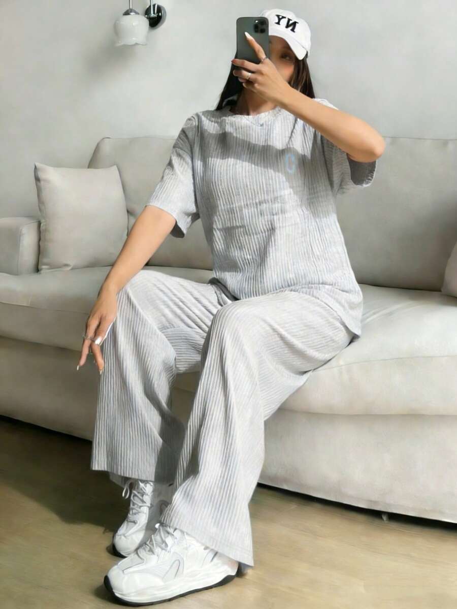 Conjunto informal de dos piezas, elegante traje bohemio de verano para mujer, de talla grande, con top holgado y pantalones anchos holgados. - Gris Claro - Ver 1