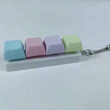 1 pièce Boîte sensorielle à quatre touches, cadeau parfait pour les amis et la famille, soulage la pression des doigts, jouet apaisant pour l'ouïe, convient pour les cadeaux de fête, les bas de Noël, les faveurs de fête, les blagues, la décoration de bureau, la décoration de voiture, les porte-clés, la décoration de l'aquarium et les cadeaux de Père Noël blanc - Multicolore - Voir 8
