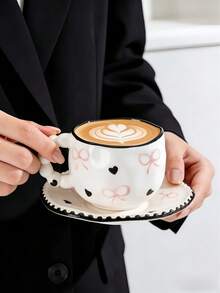 Bộ 1 tách và đĩa sứ nặn tay hình nơ và trái tim, kiểu Pháp dễ thương với họa tiết chấm bi nơ và trái tim, thích hợp dùng trong tiệc trà chiều và tráng miệng, quà tặng chất lượng cao, phù hợp cho nhà hàng, phòng khách, quán cà phê, làm quà tặng hoặc tiệc tùng. - Nhiều màu - Xem 11