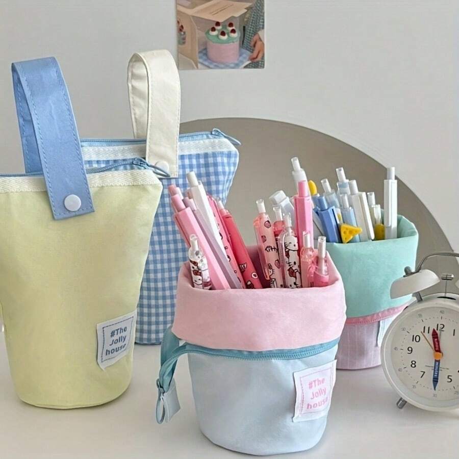 1 túi vải canvas có khóa kéo thời trang, có thể dùng làm hộp đựng bút và đồ dùng văn phòng, được làm từ chất liệu vải canvas dung tích lớn.