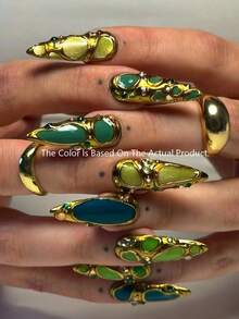 Bộ móng giả nhọn dài nhiều màu sắc: Móng xanh lá, móng xanh dương, 10 miếng/bộ. Móng giả màu xanh lá cây bóng bẩy phong cách Baroque Y2K, móng xanh dương, móng đỏ, móng cam, với họa tiết lượn sóng vẽ tay, đầu móng acrylic kiểu Gothic cung điện Pháp nhọn, kèm bộ dụng cụ làm móng gel miễn phí. - Nhiều màu - Xem 3