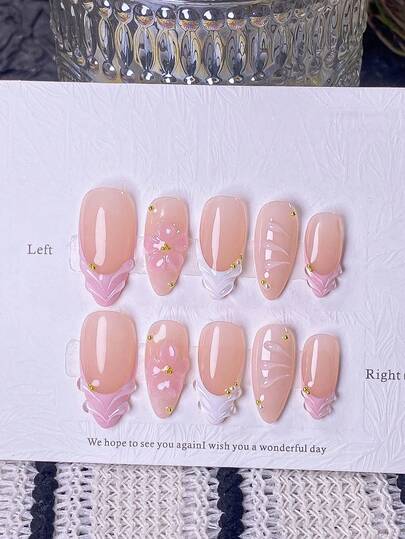 10pcs Handmade Almond-Shaped Pink & White French Fake Nails With 3D Pink Carved Designs. Handcrafted Pink 3D Carvings, Hand-Painted Pink And White French Tips, 3D Water Ripple Lines Decorated With Golden Steel Beads. Elegant, Romantic And Minimalist Wearable Nails, Offering A Luxurious, Sexy And Light-Luxury Finish. Perfect For Daily Wear, Dates, Concerts And Light Business Occasions. An Ideal Gift For Women And Girls.