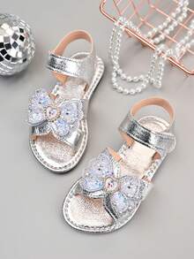 Giày sandal nơ đính đá bạc mới cho bé gái mùa hè 2026, kiểu công chúa đang thịnh hành, đế mềm chống trơn trượt. - Bạc - Xem 3