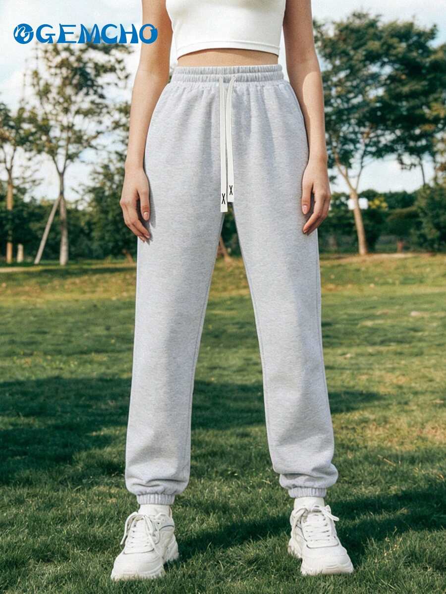 GEMCHO Women's Polyester Sweatpants With Pockets, Knit Fabric With Slight Stretch, Casual Jogging Pants Suitable For All Seasons - Light Grey - View 1