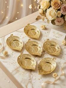 创意树叶烛台、烛托、金属树叶形底座，适用于户外庭院装饰、婚礼装饰烛台、办公室桌面装饰、烛光晚餐，营造室内氛围，也适用于婚礼、家庭聚会、派对、告别仪式和餐桌装饰等场合。 - 樹葉款 - 查看 10