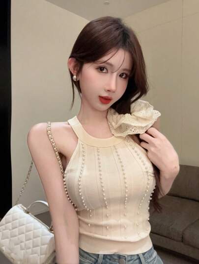 Áo hai dây dệt kim ôm sát, không tay, đính ngọc trai giả, hở vai, gợi cảm, thích hợp mặc thường ngày.