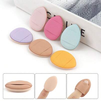 MyAoKuE-Up 10 Piezas de Almohadillas de Polvo para Dedos, una esponja cosmética para maquillaje de belleza, se puede usar con BB Cream, líquido de base y corrector. Es adecuado para cubrir imperfecciones locales, manchas y para un contorneo preciso alrededor de los ojos, la nariz y la boca. Se expande cuando está húmedo y se puede usar tanto seco como húmedo. Es adecuado para todo tipo de piel.