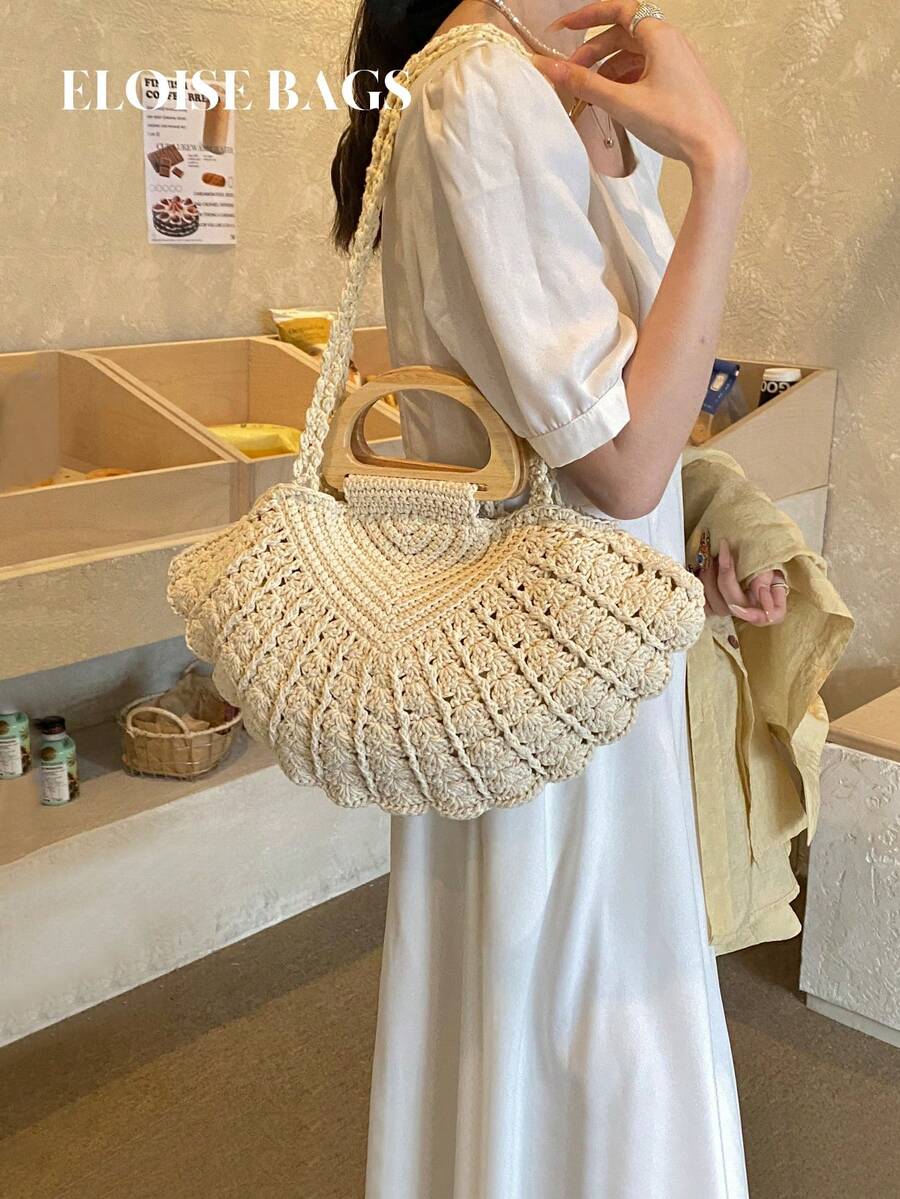 Túi xách tay dệt vỏ sò phong cách retro Pháp mới năm 2026, túi tote nữ mùa xuân/hè, túi đeo vai đa năng dung tích lớn, thích hợp cho kỳ nghỉ biển.