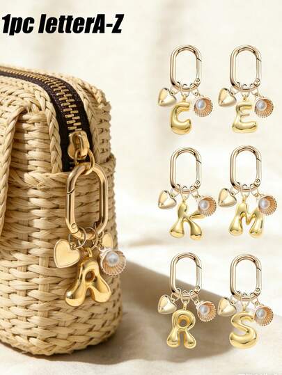 金色泡泡字母 A-Z 钥匙扣，可爱字母吊坠，搭配心形和海洋珍珠贝壳，闪亮金属字母钥匙圈，个性化包包挂饰，手提包背包挂件，汽车钥匙扣装饰。适合日常使用、旅行、上学、购物、送礼。是情人节、生日、节日送给女孩、青少年、女性、朋友的完美礼物。也适合婚礼季、作为纪念品、伴娘礼物。