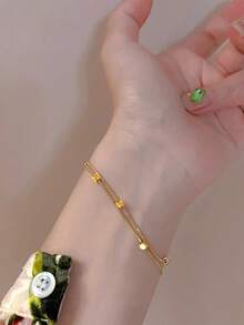 1 pieza Brazalete de acero inoxidable ligero de doble capa con diseño de hueso de serpiente dorado, joyería básica geométrica de acero de titanio para uso diario - Amarillo Oro - Ver 2