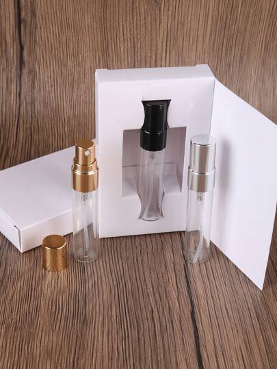 15个5毫升透明玻璃喷雾瓶，配铝制喷头，金色、银色和黑色可选，精美包装盒，可重复灌装，适合旅行和商务出行，是馈赠亲朋好友的理想之选。