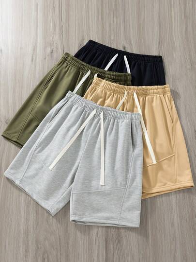 男士宽松休闲运动短裤，适合健身、篮球、训练、跑步、锻炼、街头、露营、海滩等场合，弹性腰带设计，配有抽绳调节，夏季穿着。