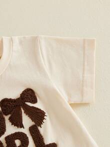 Conjunto de verano de 2 piezas para niña pequeña estilo vaquera: camiseta de manga corta con lazo y letras bordadas y pantalones acampanados con estampado de manchas de vaca. - Albaricoque - Ver 7