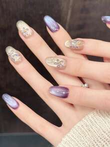 10片手工短椭圆美甲贴纸，适合派对和日常佩戴，“柔紫金枝”紫色猫眼金花高端大气，短椭圆美甲贴纸，易于佩戴。10片Y2K风格手工美甲贴纸，适合女孩和女士参加节日派对、音乐节、日常佩戴，也是情人节、母亲节礼物的理想选择。 - 紫丁香色 - 查看 3