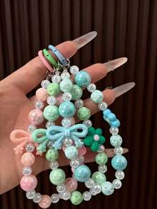 1个时尚优雅蝴蝶钥匙扣 | 亚克力和铁材质，非常适合挂在女士包包上、车钥匙上，也是节日礼物的理想之选 - 彩色 - 查看 5