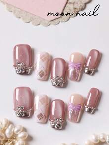 10片紫色猫眼蝴蝶结闪光钻石条纹美甲贴片，适用于短指甲，包含1张粘合贴片和1个迷你指甲锉。 - 彩色 - 查看 1