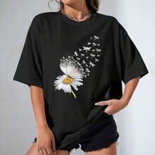 Camiseta de mujer de manga corta negra - Estilo bohemio y delicado - Estampado de margarita con mariposa que se transforma en libélulas, diseño etéreo y elegante - Ropa diaria cómoda para mujer, confeccionada en suave mezcla de algodón, ideal para trabajo y looks cotidianos. - Negro - Ver 2