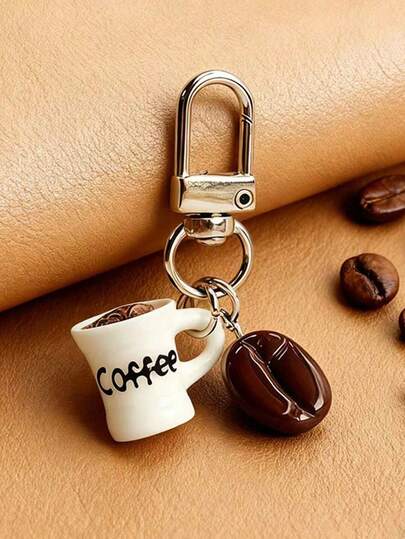 1 pieza Llavero de taza de café, diseño realista de taza de grano de café, material de resina ligero, adecuado para amantes del café, se puede colgar en mochilas, carteras, oficinas, etc. como decoración, también se puede usar como un accesorio divertido, regalo festivo o colgante para entusiastas del café. Hecho a mano, combinando colgante y funcionalidad, un regalo ideal para amantes del café.