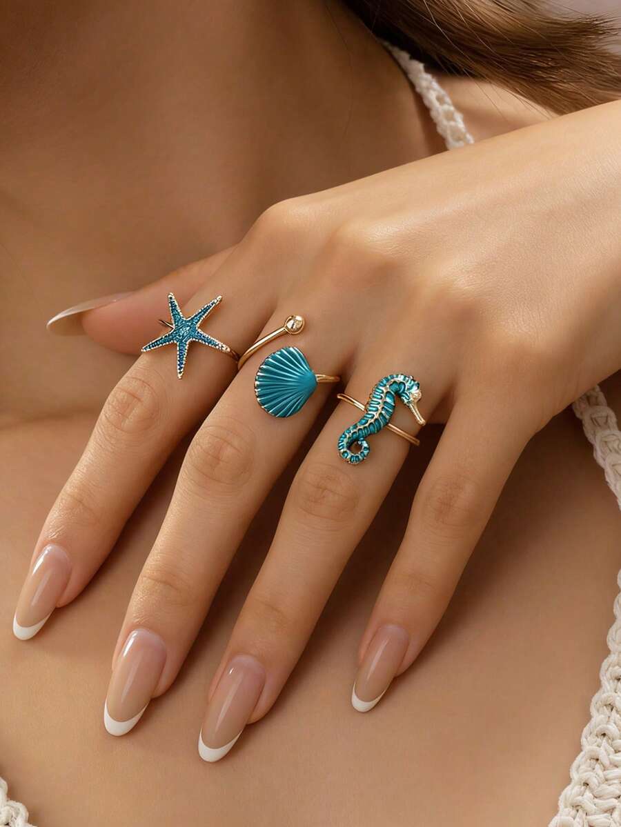 Set de 3 anillos de estilo bohemio con estrella de mar, concha y caballito de mar esmaltados en azul - Joyería ajustable de tono dorado con diseño de océano y playa - Multicolor - Ver 1