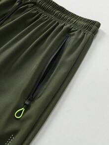 Pantalones cortos deportivos de verano ligeros para hombre, pantalones cortos con bolsillo con cremallera de unicolor estampado, pantalones de fitness y running transpirables de secado rápido - Verde militar - Ver 7