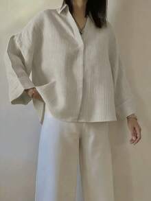 Áo sơ mi nữ tay dài cổ bẻ, vai rớt, kẻ sọc, chất liệu polyester, thiết kế cài nút phía trước, dáng suông, không co giãn, thích hợp mặc mùa xuân. - Màu be - Xem 5