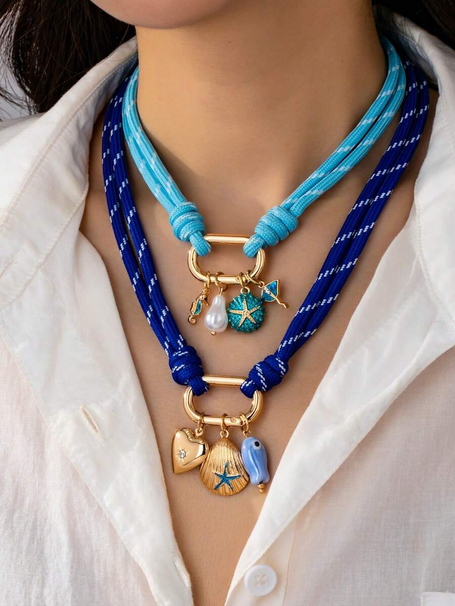 1 chiếc vòng cổ dây thừng màu xanh dương phong cách Bohemian với mặt dây chuyền hình móc khóa và hình sinh vật biển - Vòng cổ nổi bật phong cách biển cả mùa hè với mặt dây chuyền hình sao biển và ổ khóa hình trái tim - Có thể tùy chỉnh, phù hợp để đeo hàng ngày và đi biển - Nhiều màu - Xem 1
