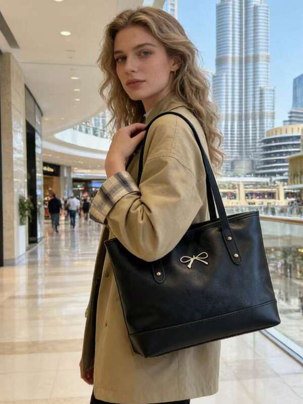 1个极简主义手提包，新款ins风，小众设计，高端质感，适合通勤、办公、约会、购物、短途旅行、周末郊游，适合都市白领、极简主义爱好者、时尚辣妈、时尚博主、通勤族