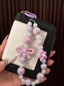 1个时尚优雅蝴蝶钥匙扣 | 亚克力和铁材质，非常适合挂在女士包包上、车钥匙上，也是节日礼物的理想之选 - 彩色 - 查看 14