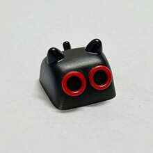 1个个性化胶粘式可爱猫咪造型键帽,3D立体键帽,已安装在树脂键盘的Esc键上。这些键帽非常适合DIY礼物制作,也是一份绝佳的生日礼物。 - 查看 19