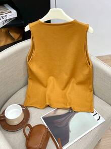 Áo vest len nữ không tay, cổ chữ V, dáng suông, cài hai hàng khuy, có túi, độ co giãn vừa phải. - Màu vàng - Xem 2