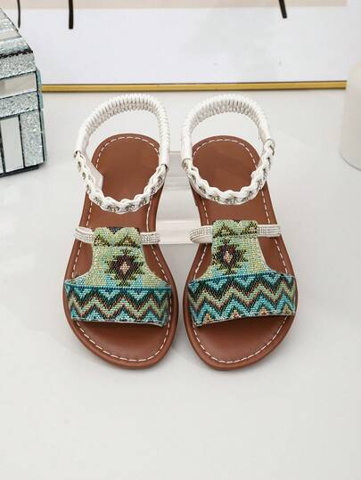 1双女童夏季时尚凉鞋，编织鞋面镶嵌水钻，多色拼接鞋面，松紧带凉鞋，适合度假和日常穿着