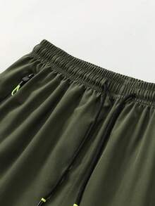 Pantalones cortos deportivos de verano ligeros para hombre, pantalones cortos con bolsillo con cremallera de unicolor estampado, pantalones de fitness y running transpirables de secado rápido - Verde militar - Ver 5