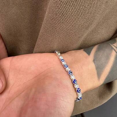 1条前卫邪眼网球手链，镶嵌闪亮水钻 | 弹性设计，朋克极简风格 | 适合日常佩戴和派对礼物