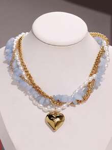 1 chiếc vòng cổ thời trang, sang trọng, cá tính, thiết kế độc đáo, hình trái tim bằng kim loại đính đá và ngọc trai giả, thích hợp đeo hàng ngày, dự lễ hội và tiệc tùng. - Nhiều màu - Xem 3