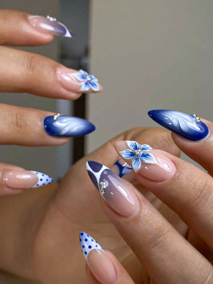 10 móng tay giả thủ công, móng ngắn, móng hình hạnh nhân, màu nude, xanh nhạt, kiểu Trung Quốc mới, thiết kế thanh lịch, móng tay năm mới, họa tiết hoa nhuộm tie-dye vẽ tay, trang trí đá và hạt cườm bạc, bao gồm dụng cụ làm móng, dễ dàng gắn và tháo, phù hợp cho phụ nữ và bé gái.