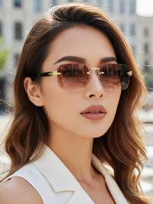 1副渐变复古时尚无框眼镜，采用优质金属无框设计，男女皆宜，适合度假、旅行、街头摄影、徒步、派对、音乐节、演唱会等场合，也是一份绝佳的礼物之选。 - 彩色 - 查看 2