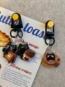 这款可爱的卡通猫咪钥匙扣是咖啡爱好者的迷人配饰。它既是完美的礼物之选，也是时尚的包包挂饰，更是任何咖啡店的绝佳点缀。这款钥匙扣是节日送礼的热门之选，也是学生和朋友背包装饰、同事纪念品的理想之选，更是提升包包外观的创意之选。 - 彩色 - 查看 4