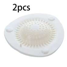 半个白色硅胶毛发收集器，适用于淋浴/浴缸排水口，带吸盘，可收集毛发并防止堵塞。是浴室水槽和厨房管道的理想家用解决方案。易于安装的排水盖 - 由耐用硅胶制成。非常适合日常收集毛发，保持排水顺畅。 - 彩色 - 查看 9