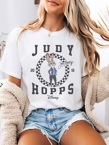 Disney-Style Women's Printed T-Shirt Featuring A Retro-Inspired Zootopia Judy Badge Design In Collegiate Cartoon Print. This Round-Neck Summer Top Is Crafted From Soft, Comfortable 100% Cotton Fabric, Perfect For Everyday Wear, Outdoor Activities, Or Shopping. It Also Makes An Ideal Choice For Women's Vacation Attire. - trắng - Xem 1
