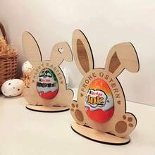 复活节限量版：1个木制兔子摆件，专为展示惊喜彩蛋而设计，印有“Happy Easter”（复活节快乐）和德语“Frohe Ostern”（复活节快乐）字样。可用作桌面装饰或复活节礼物，既能展示彩蛋，又能增添节日气氛，适合家庭活动或派对装饰。 - A - 查看 2