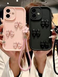 1 ốp lưng điện thoại trang trí nơ hồng 3D kèm dây đeo cổ tay bện và mặt dây chuyền hoa, ốp bảo vệ chống rơi vỡ cao cấp, mờ, tương thích với iPhone, phiên bản quốc tế, không phải phiên bản nội địa. - Hồng + Nơ - Xem 5