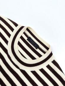Prada Striped Embroidered Crew Neck Sweater, Custom-Knitted Mercerized Wool Blend Fabric, Soft, Delicate, Comfortable Against The Skin. The Creamy Hue And Warm Brown Tones Intertwine In The Knit Texture, Creating A Design Tension Between Movement And Stillness. The Iconic Prada Embroidery, A Subtle Yet Powerful Logo Hidden Among The Stripes, Flows In The Sunlight, The Logo Appearing And Disappearing In The Light And Shadow. The Design Is Seamlessly Integrated, Achieving The Ultimate In Aesthetics. Using Stripes As The Brush And Knitting As The Ink, A New Chapter Of Fashion Is Woven. Imported Machine Embroidery Technology, Using An Advanced Computer Control System And Precision Mechanical Parts, Achieves High Precision In Prada Embroidery, Resulting In Smooth And Delicate Lines. - 25341-B30 - Xem 4