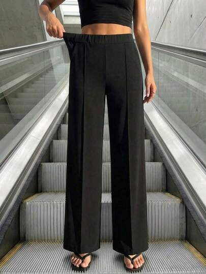 女士休闲纯色中腰口袋外露缝线直筒裤，适合春夏穿着，可搭配春夏服装、春夏上衣、春夏服饰、外出上衣、女士休闲裤、女士休闲直筒裤。