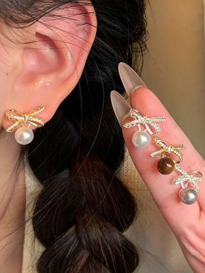 Brogan-Style Pearl-Shaped Earrings For Women, Featuring A Tiger-Eye Stone. These Earrings Exude A Feminine And Gentle Charm.