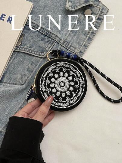 Ví đựng tiền xu mini màu đen thêu họa tiết retro mới, ví tròn nhỏ đeo cổ tay.