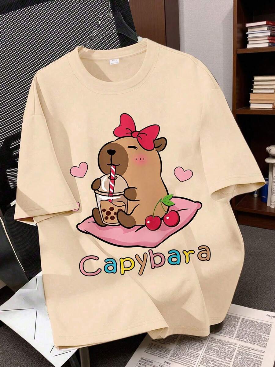 可爱卡通水豚印花，萌萌蝴蝶结动漫印花，女童休闲短袖T恤，适合夏季穿着 - 杏色 - 查看 1